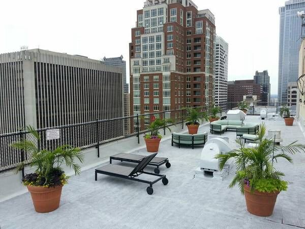 Rooftop sundeck with lounge seating and views of downtown Philadelphia