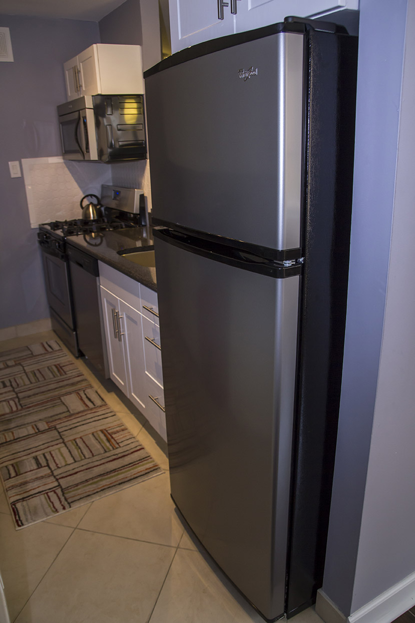 Stainless Steel Whirlpool refrigerator with freezer